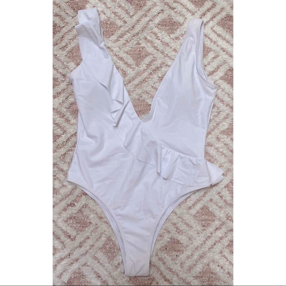White v ruffle one piece size M NEW